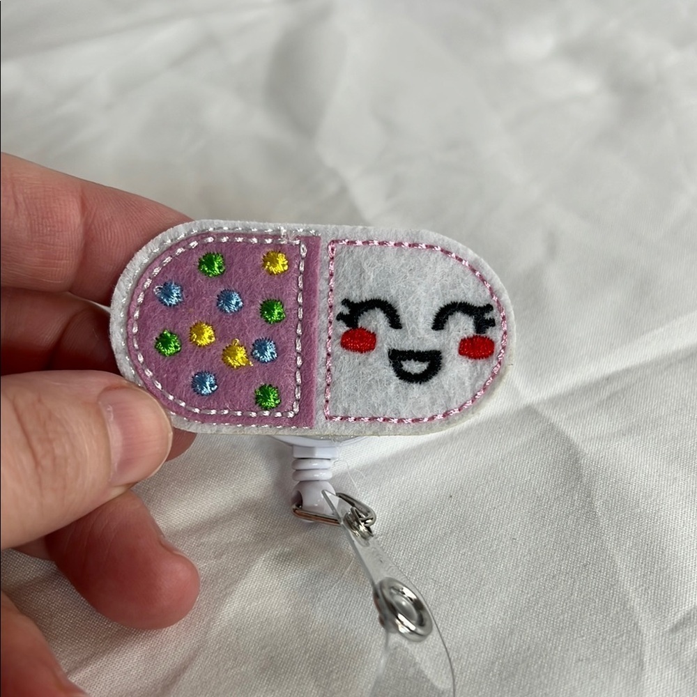 Cute Smiling Badge Reel with Colorful Dots